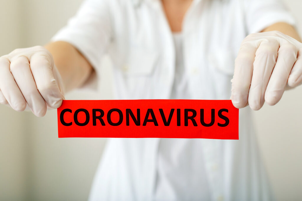 Coronavirus, Red Warning Sign With The Text Coronavirus In Docto