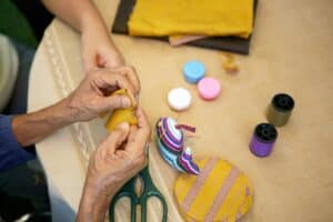 Senior home care encourages creativity through art, music, and meaningful activities.
